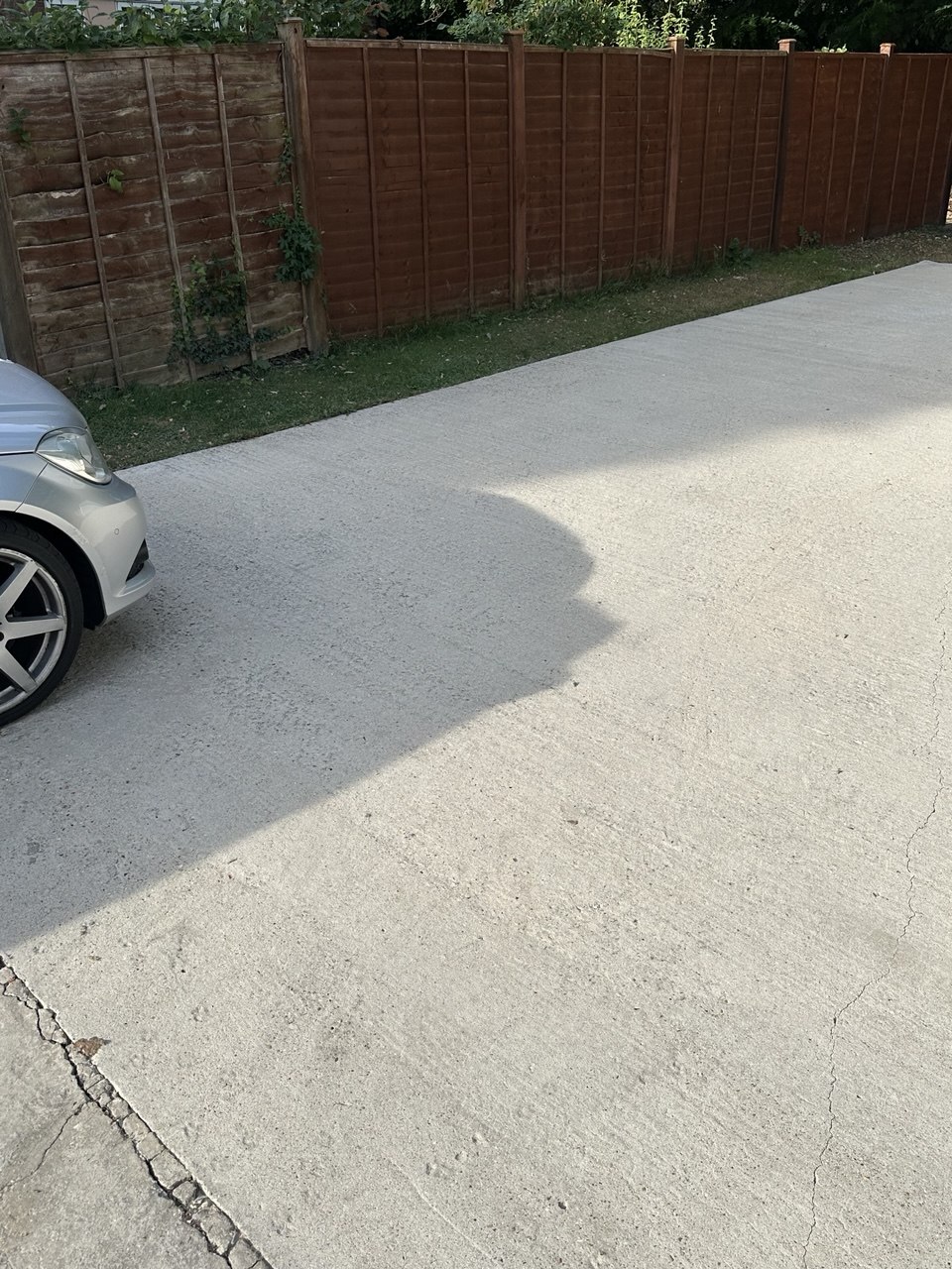 Large concrete driveway before