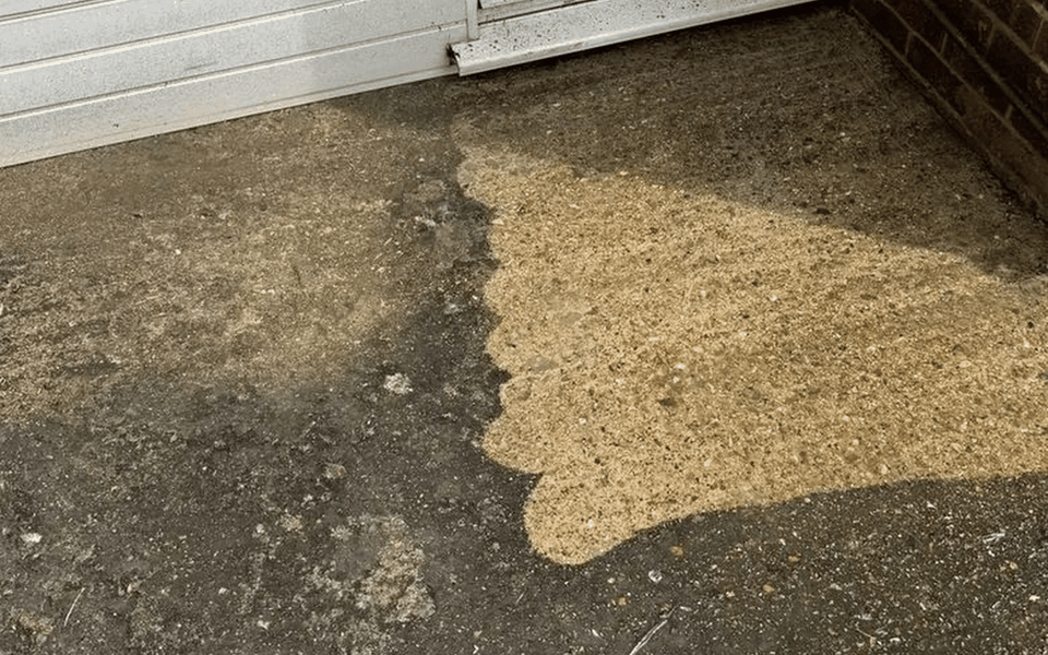 Garage Doorstep before and after pressure washing by OnlyClean